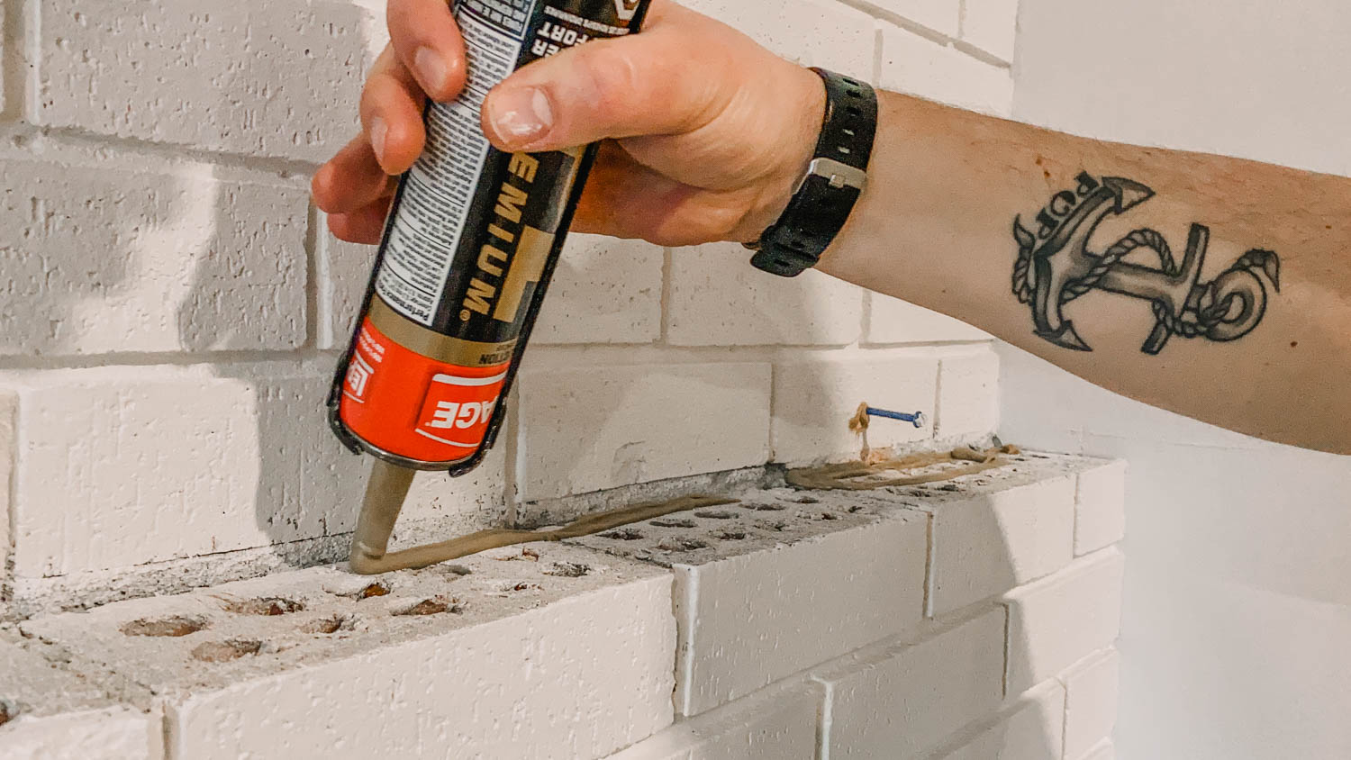How to install a chunky wood mantel on brick