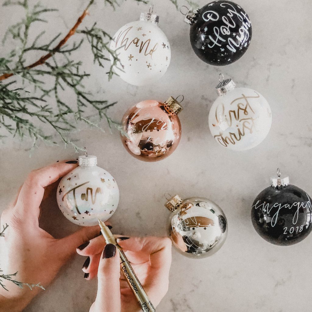handlettering on glass balls for christmas