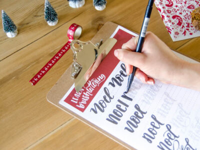 Free Printable Noel Holiday Brush Lettering worksheet- what a great idea to practice handlettering this way!