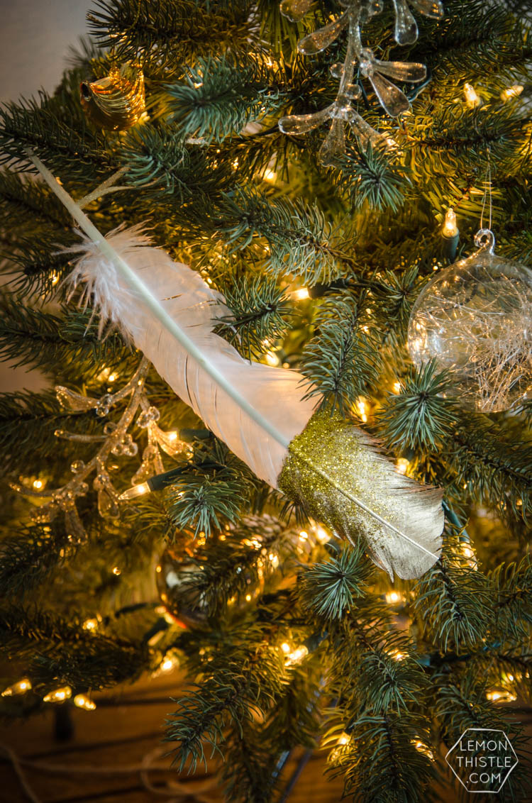 DIY gilded and glittered feather gift toppers... these would make cute christmas ornaments too!